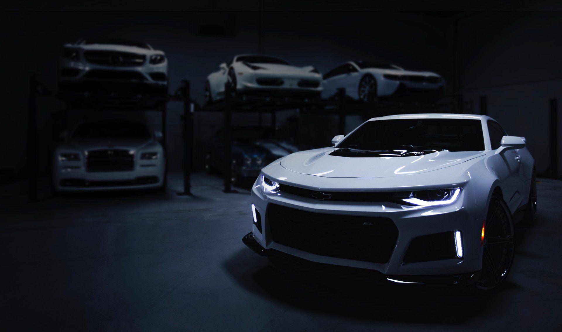 Luxury cars in a professional workshop